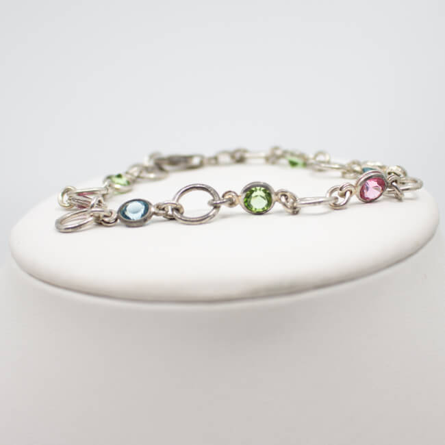 Armband mit bunten Glaskristallen 925 Silber Bild 1 925er Armband mit bunten Zirkonia liegend