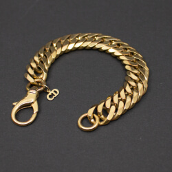 Dior massives goldenes Panzerarmband