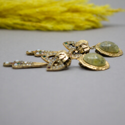 Dueci Bijoux goldene Ohrclips, liegend