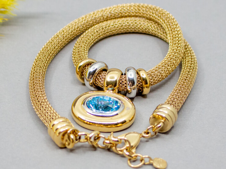 goldenes Henkel & Grossé Collier mit blauem Glas
