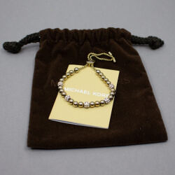 Michael Kors Armband Gold & Glitzerperlen inkl. OVP Michael Kors goldenes Perlen-Armband mit Glitzerstein