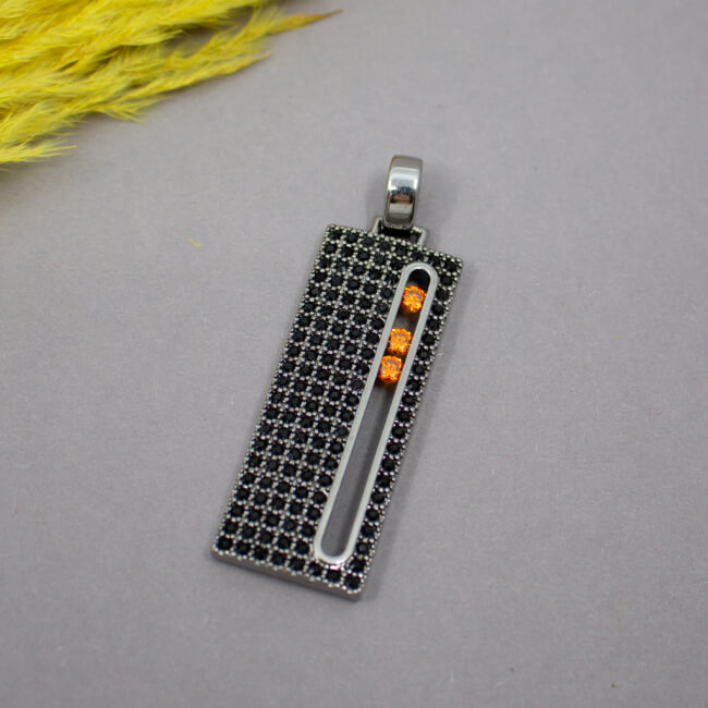 Eleganter Pierre Lang Anhänger in Schwarz u. Orange Bild 1 Pierre Lang geschwaerzter Anhaenger