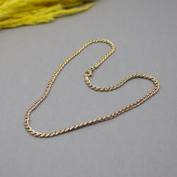 Zeitlose Pierre Lang Unisex Ankerkette vergoldet Pierre Lang goldene Ankerkette liegend