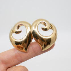 Pierre Lang goldene Ohrringe 'Spirale' Seite
