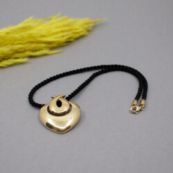 Pierre Lang Kordel-Kette mit goldenen Herz-Design Pierre Lang Kordel-Kette mit Ornament Anhaenger