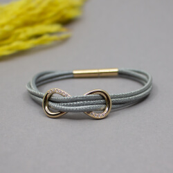 Pierre Lang Lederarmband mit goldenem Element Pierre Lang Stoffkette mit goldenem Element