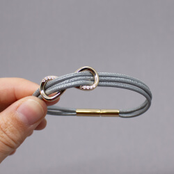 Pierre Lang Stoffkette mit goldenem Element Detail