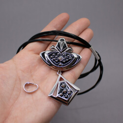 Pierre Lang schwarzes Collier Serie 'Rock' Bild 4 Pierre Lang Wechsel-Halskette mit silbernen Anhaengern Groesse