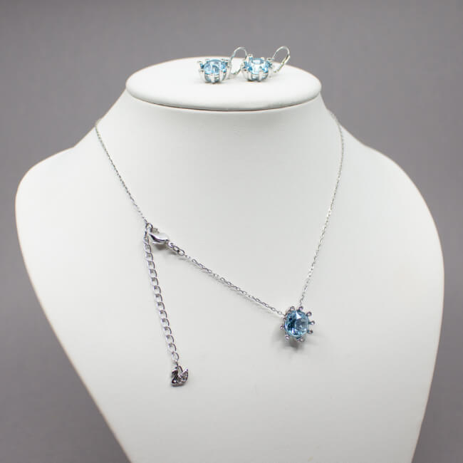 Swarovski silbernes Set mit blauem Stein